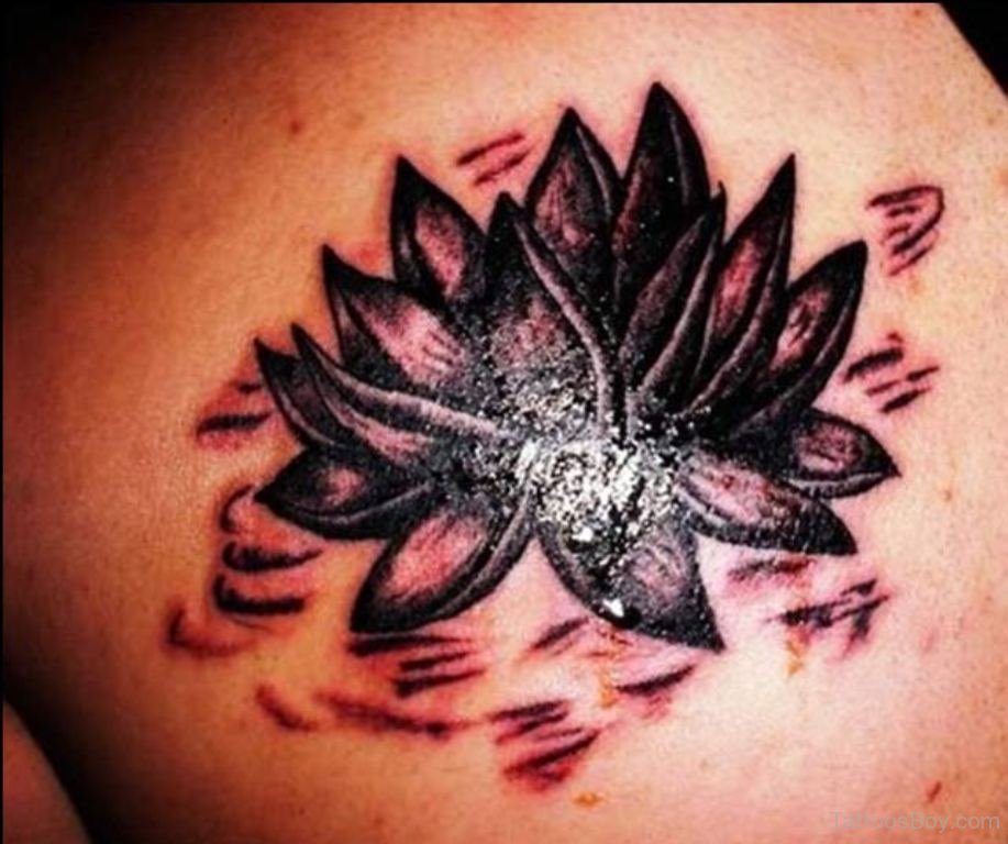 Black Ink Lotus Flower Tattoo Design For Men