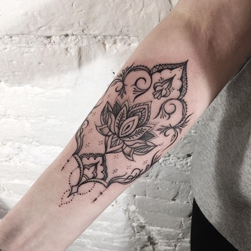 Black Ink Lotus Flower Tattoo On Right Forearm
