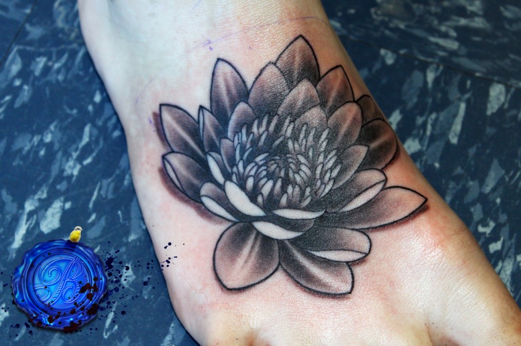 Black Ink Lotus Tattoo On Right Foot