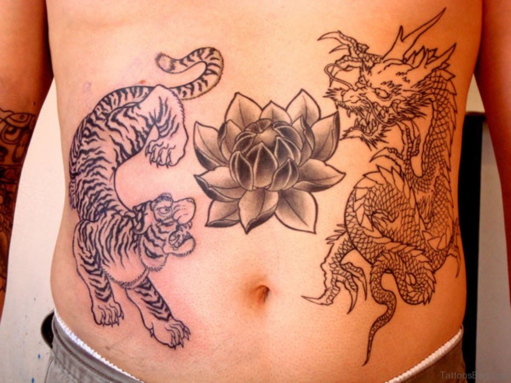 Black Ink Lotus With Tiger And Dragon Tattoo On Man Stomach