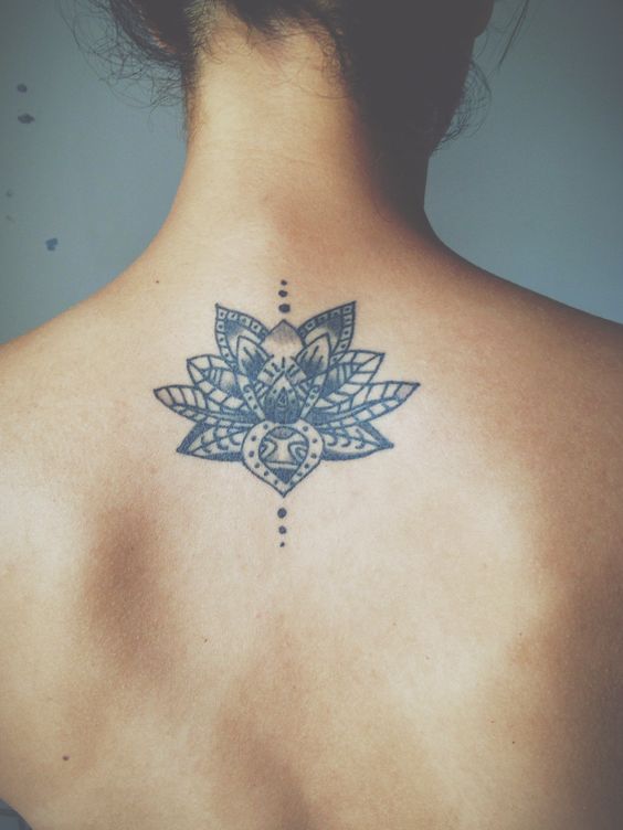 Black Ink Mandala Lotus Flower Tattoo On Girl Back Neck