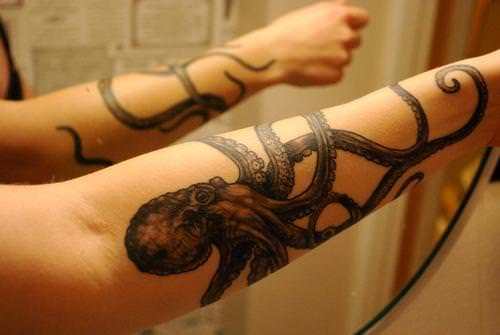 Black Ink Octopus Tattoo On Girl Left Forearm