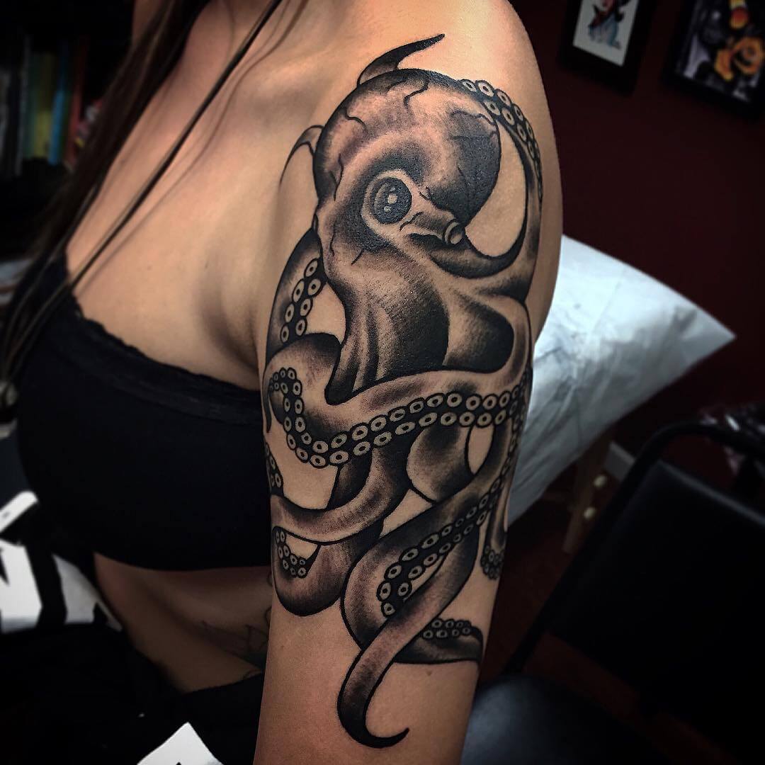 Black Ink Octopus Tattoo On Women Left Shoulder