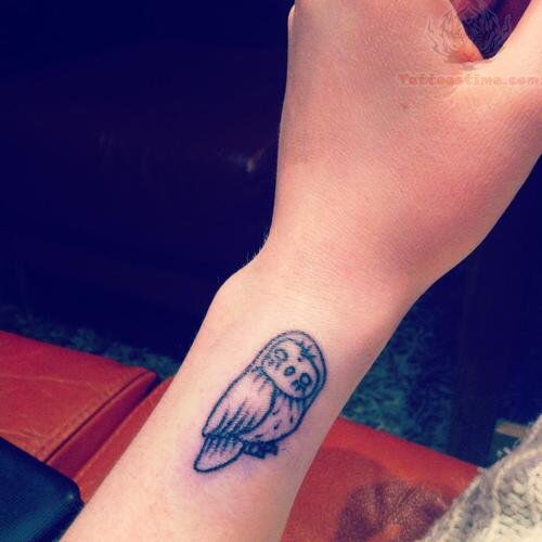 Black Ink Owl Tattoo On Left Side Wrist
