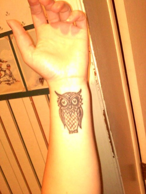 Black Ink Owl Tattoo On Left Wrist