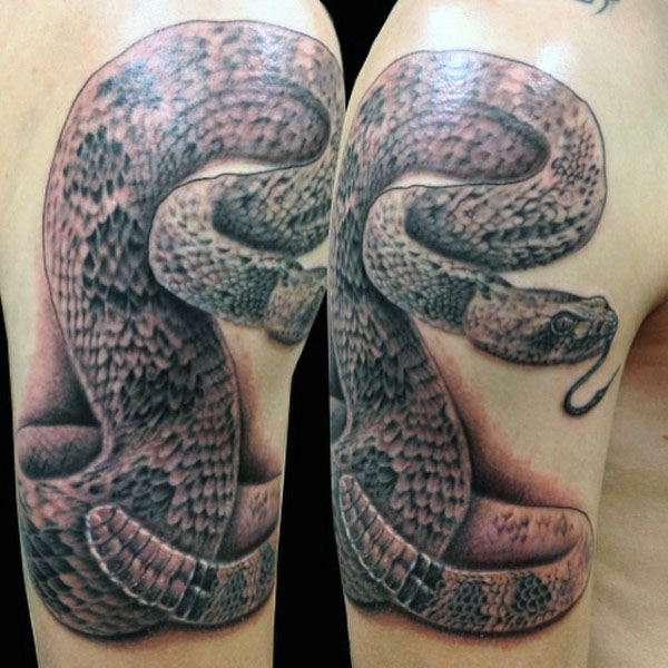 Black Ink Rattlesnake Tattoo On Right Half Sleeve