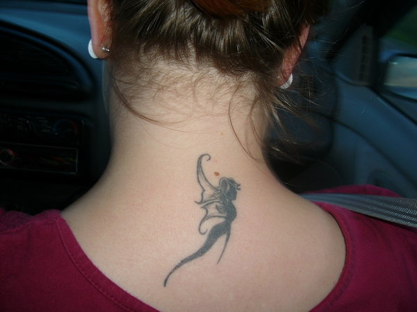 Black Ink Small Flying Fairy Tattoo On Girl Back Neck