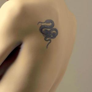 Black Ink Snake Tattoo On Left Back Shoulder