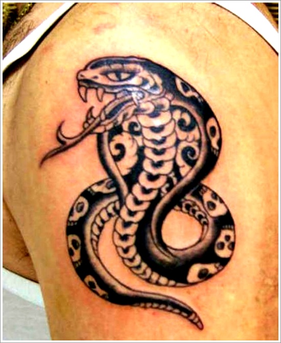 Black Ink Snake Tattoo On Man Left Shoulder
