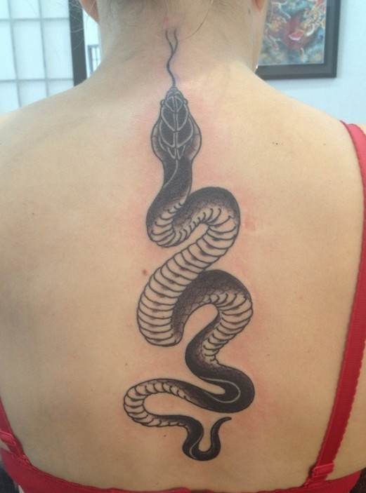 Black Ink Snake Tattoo On Women Upper Back