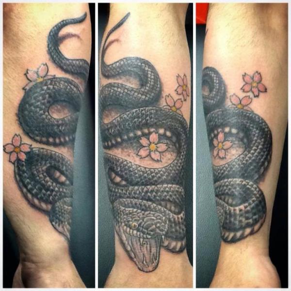 Black Ink Snake With Flowers Tattoo Design For Forearm