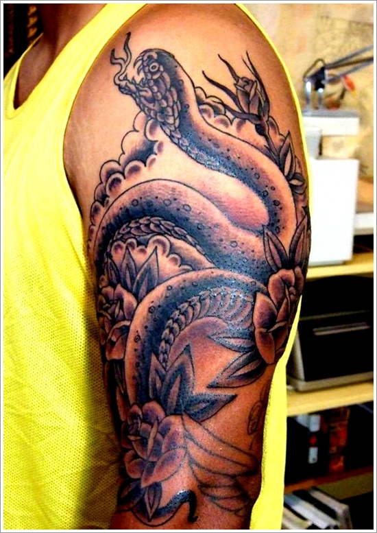 Black Ink Snake With Flowers Tattoo On Left Half Sleeve