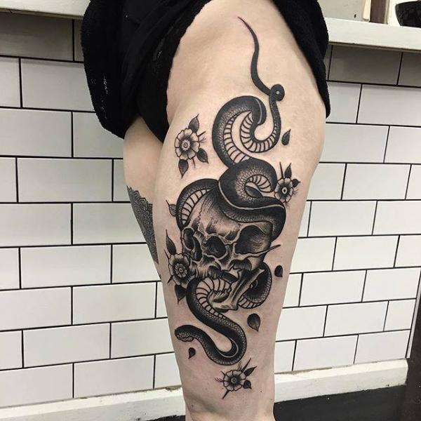 Black Ink Snake With Skull Tattoo On Left Thigh