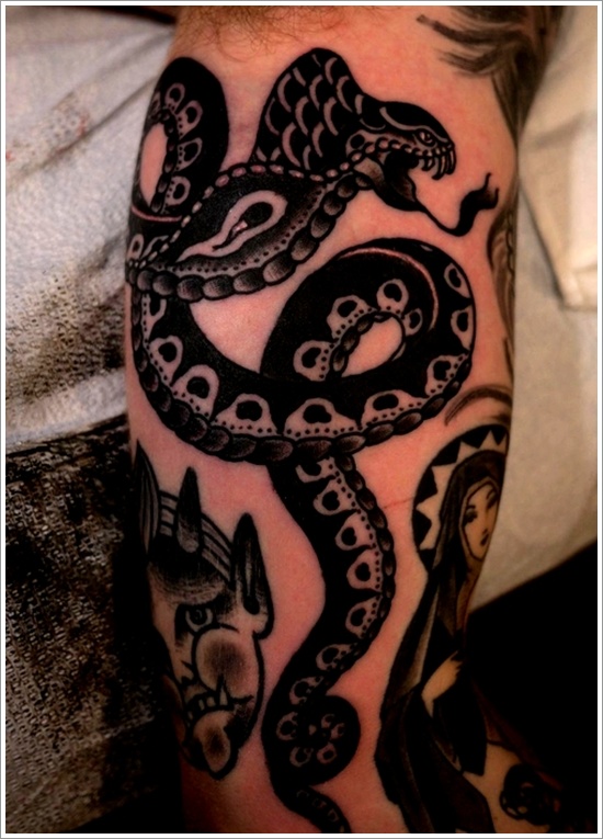 Black Ink Traditional Snake Tattoo Design For Bicep