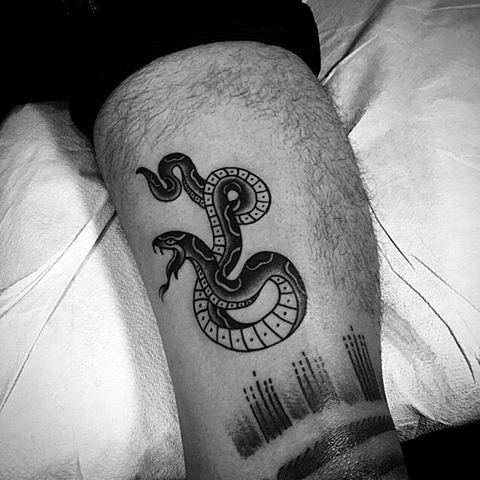 Black Ink Traditional Snake Tattoo Design For Leg