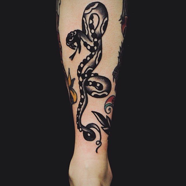 Black Ink Traditional Snake Tattoo On Right Leg Calf