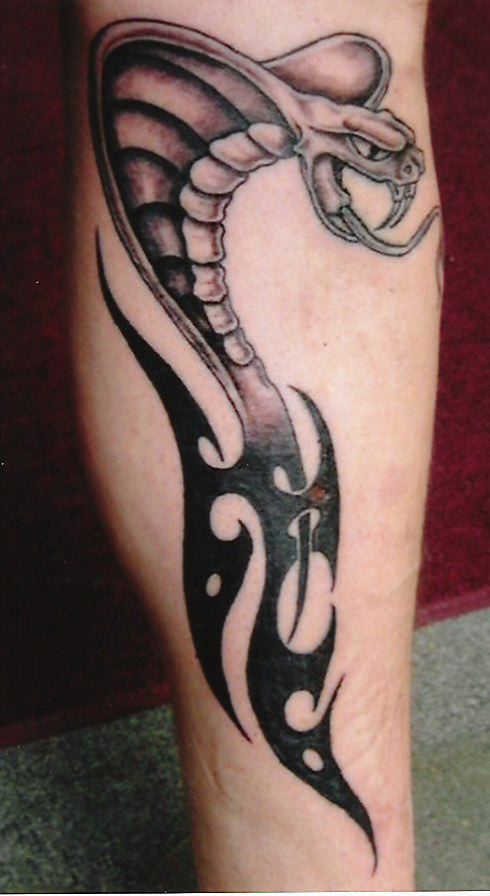 Black Ink Tribal Cobra Snake Tattoo Design For Sleeve