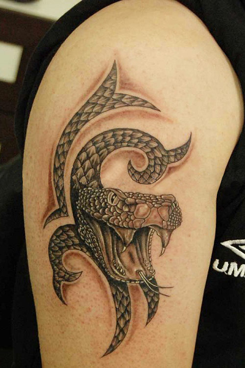 Black Ink Tribal Snake Tattoo On Right Upper Arm