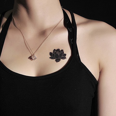 Black Lotus Flower Tattoo On Girl Collarbone