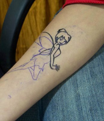 Black Outline Fairy Tattoo On Forearm
