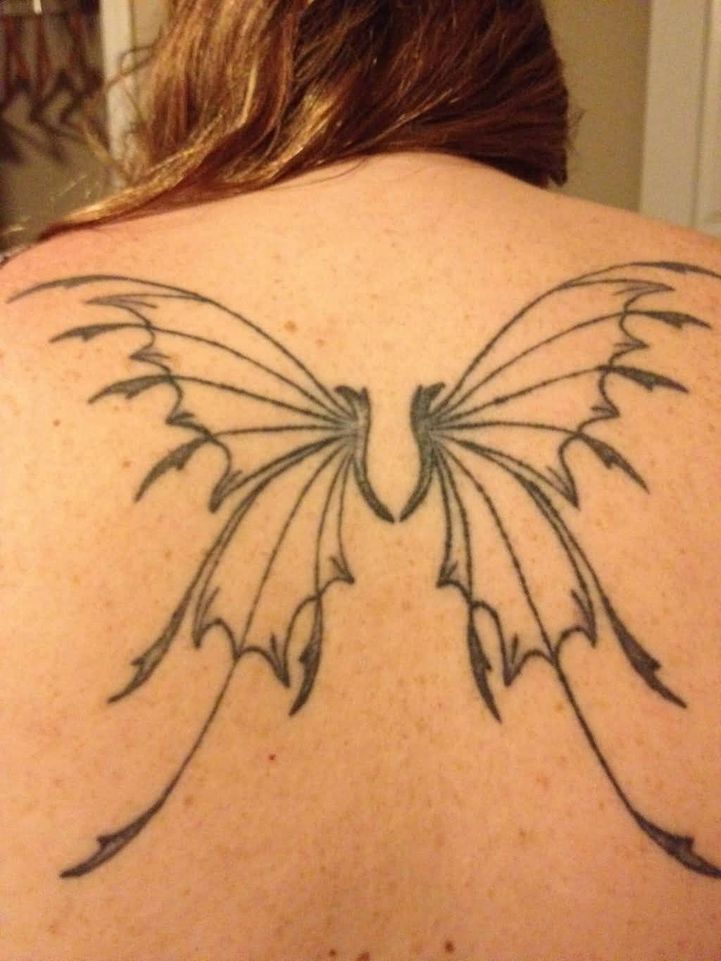 Black Outline Fairy Wings Tattoo On Women Upper Back