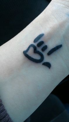 Black Outline I Love You Sign Tattoo On Wrist