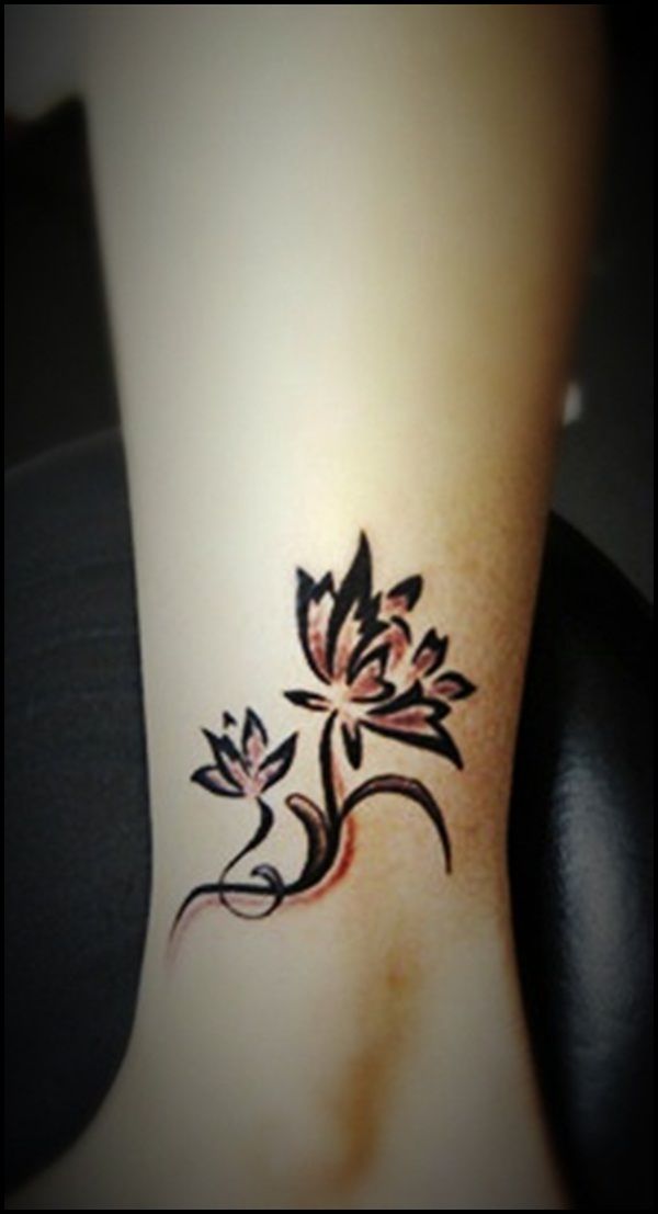 Black Outline Lily Tattoo On Ankle