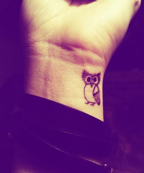 Black Owl Tattoo On Right Wrist By Tamara