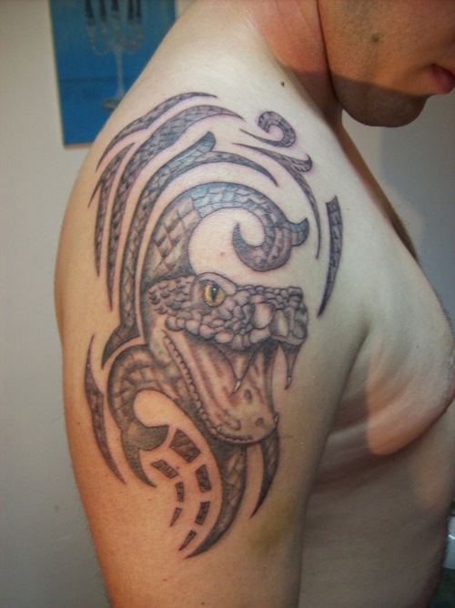 Black Tribal Cobra Snake Tattoo On Man Right Shoulder