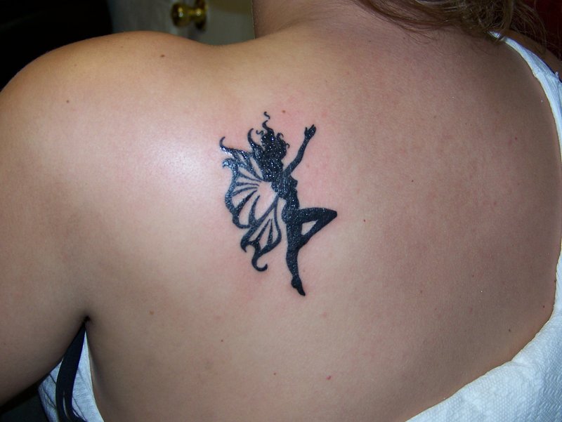 Black Tribal Fairy Tattoo On Girl Left Back Shoulder By Priscilla Wilkerson