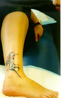 Black Tribal Fairy Tattoo On Right Ankle