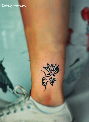 Black Tribal Lotus Flower Tattoo On Left Ankle