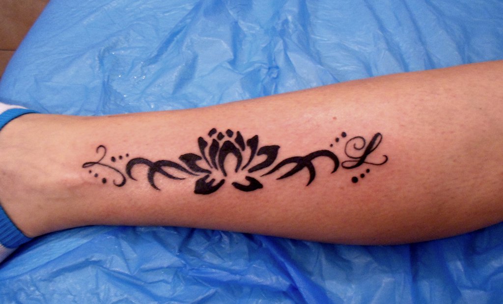 Black Tribal Lotus Tattoo On Leg Calf