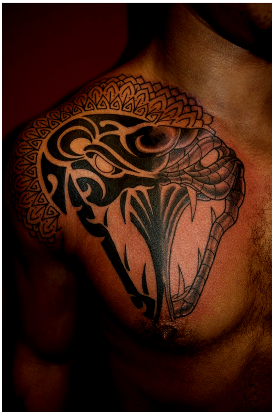 Black Tribal Snake Head Tattoo On Man Right Front Shoulder