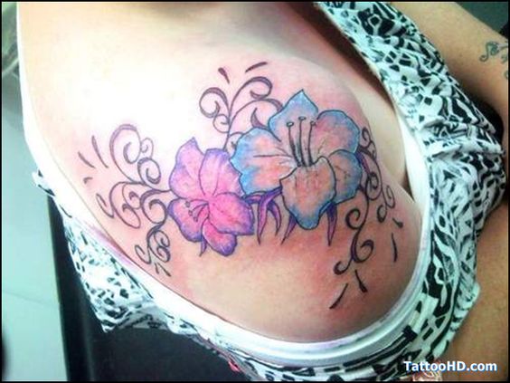 Blue And Pink Lily Flowers Tattoo On Right Shoulder
