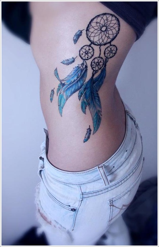 Blue Ink Dreamcatcher Tattoo On Side Rib