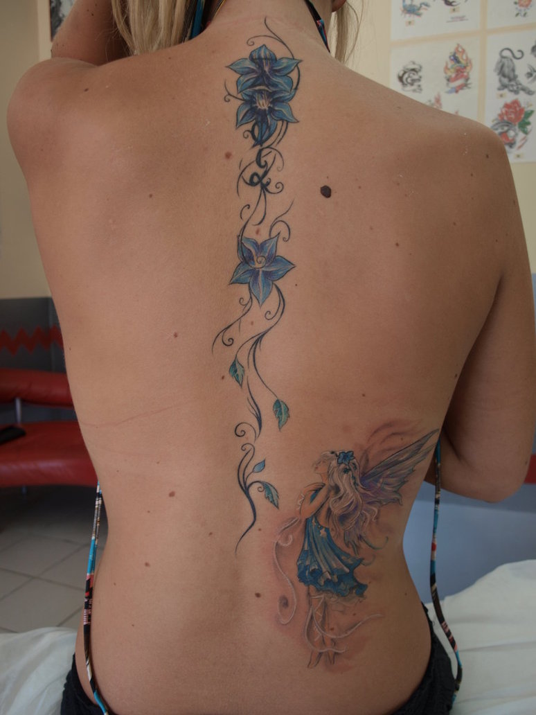 Blue Ink Fairy With Flowers Tattoo On Girl Full Back