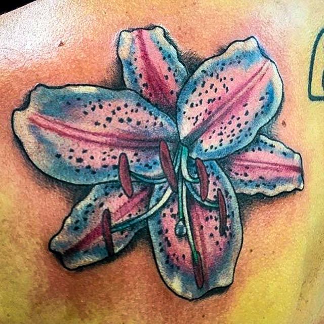 Blue Ink Stargazer Lily Tattoo On Left Back Shoulder
