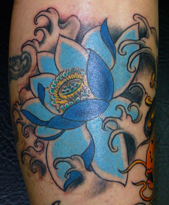 Blue Ink Traditional Lotus Tattoo Design For Leg Calf