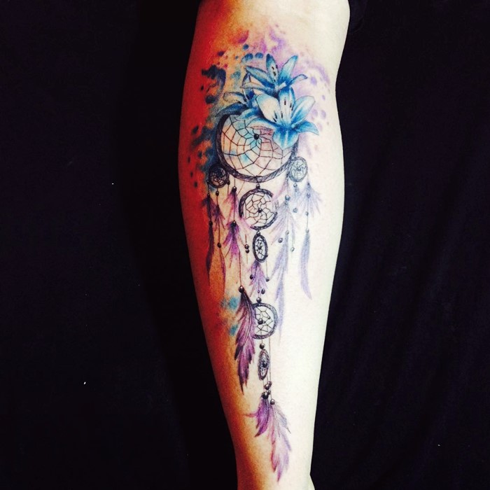 Blue Lily Flowers And Colorful Dreamcatcher Tattoo On Leg