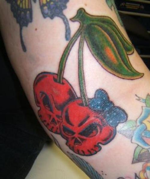 Bow Cherry Skull Tattoo On Sleeve