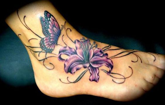 Butterfly And Purple Lily Tattoo On Right Foot