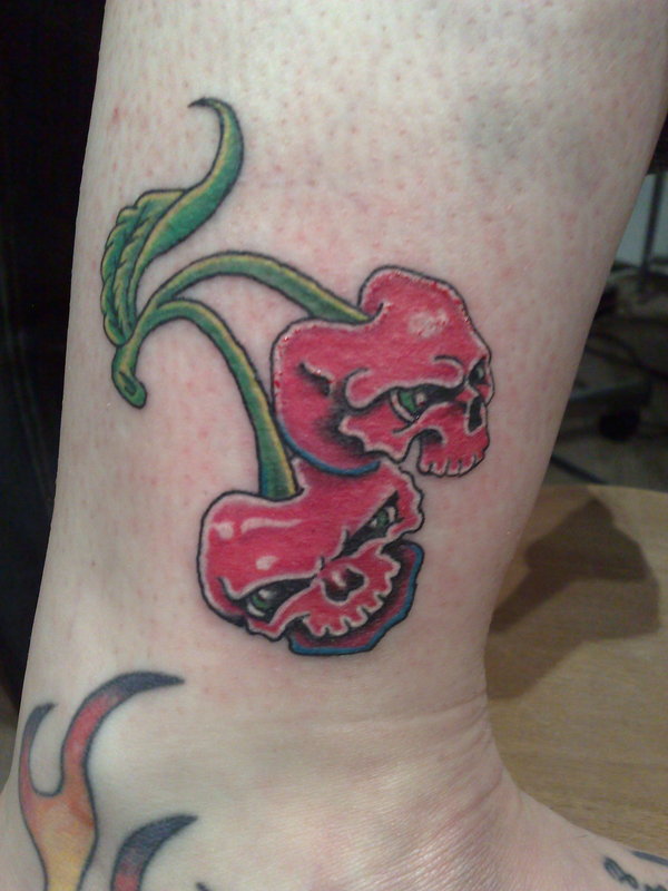 Cherry Skull Tattoos On Side Leg