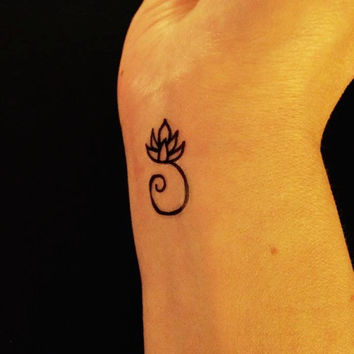 Classic Black Outline Lotus Flower Tattoo On Wrist