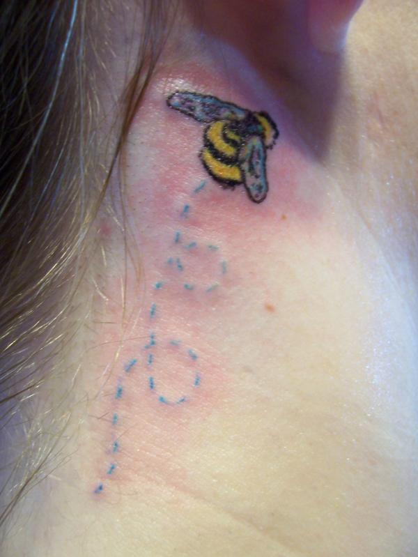 Classic Bumblebee Tattoo On Right Behind The Ear