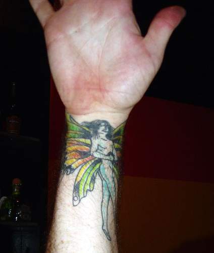 Classic Colorful Fairy Tattoo On Right Wrist