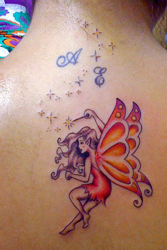 Classic Colorful Fairy Tattoo On Upper Back