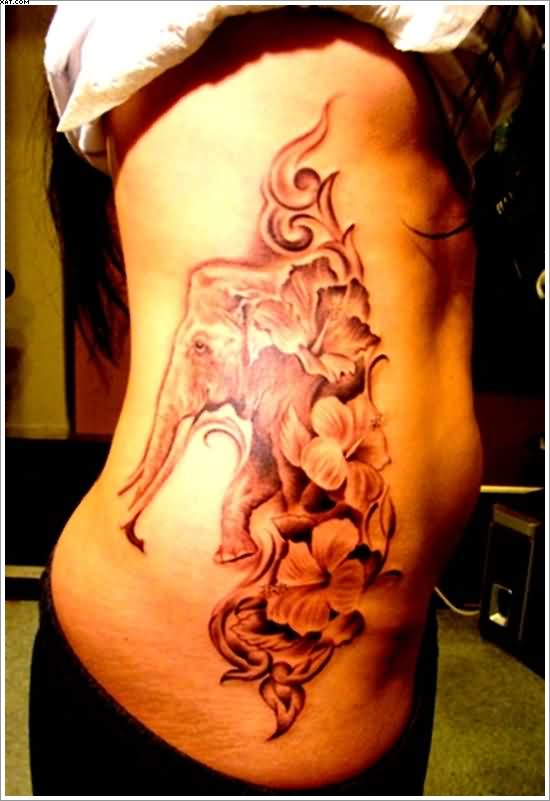 Classic Elephant With Flowers Tattoo On Girl Right Side Rib
