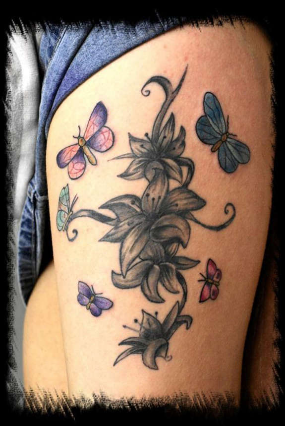 Classic Lily With Flying Butterflies Tattoo On Left Side Thigh