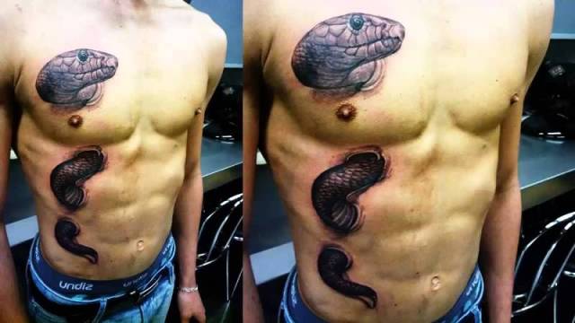 Classic Ripped Skin Snake Tattoo On Man Full Body